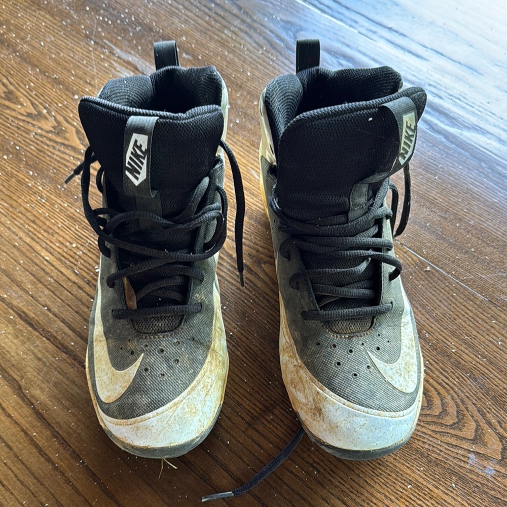 Nike Black and White High-Top Cleats